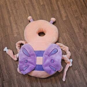 Baby Head Protector Backpack in Pink Butterfly. Good condition